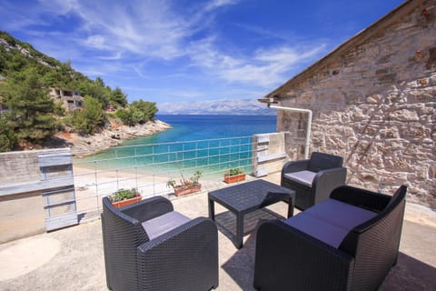 View (from property/room), Balcony/Terrace, Seating area, Beach, Sea view