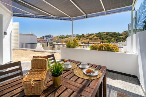 Property building, Patio, Day, View (from property/room), Balcony/Terrace, Seating area, Dining area