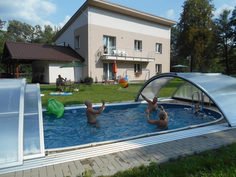 Property building, People, Swimming pool, Swimming pool