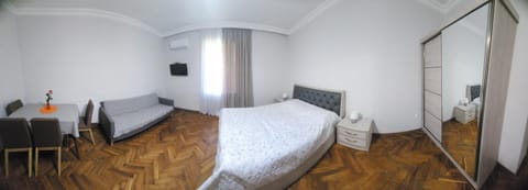 Bed, Living room, Seating area, Bedroom