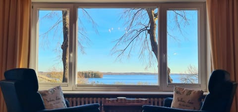 Natural landscape, Living room, Seating area, Lake view
