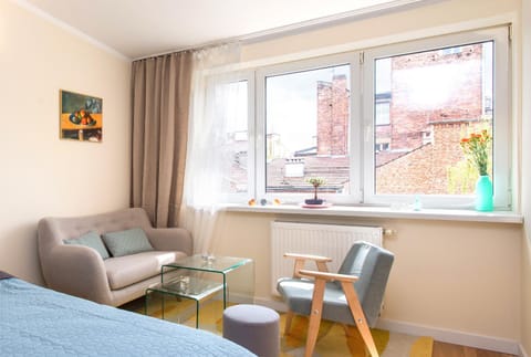 Living room, Seating area, Bedroom, City view, Garden view, Landmark view