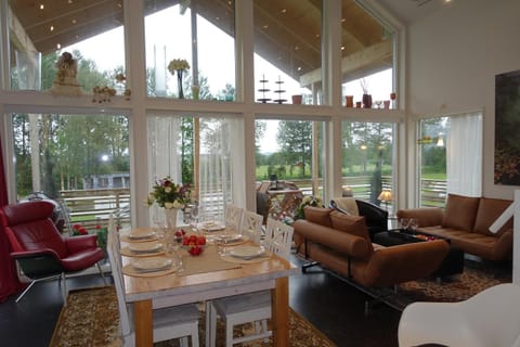 View (from property/room), Living room, Lounge or bar, Seating area, Dining area, Garden view