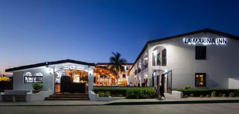 Property building, Restaurant/places to eat, Property logo or sign, Sunset