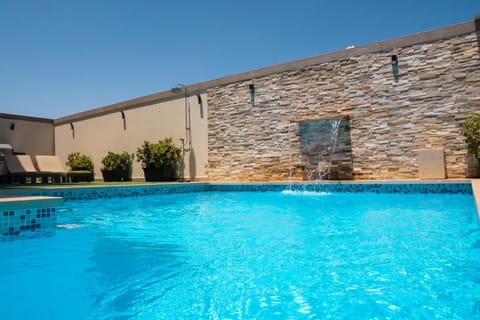 Swimming pool, sunbed