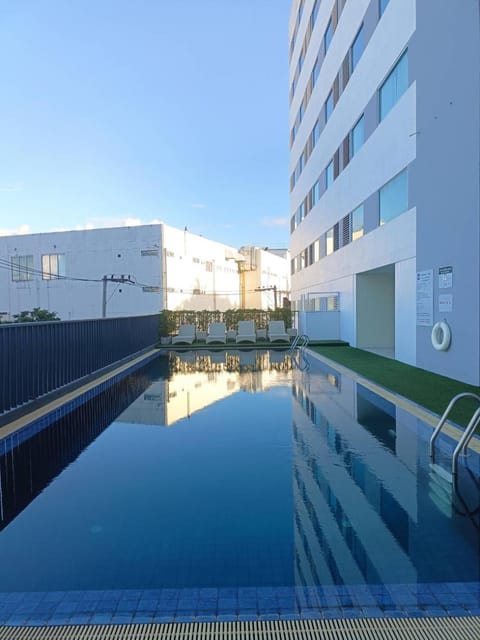 Property building, Day, Pool view, Swimming pool