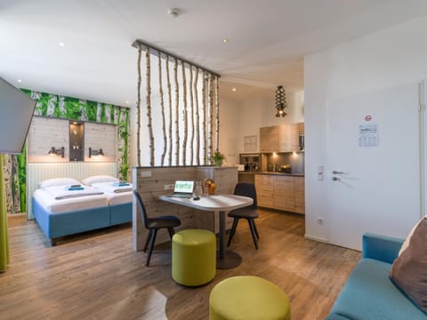 Kitchen or kitchenette, Living room, Seating area, Dining area, Bedroom