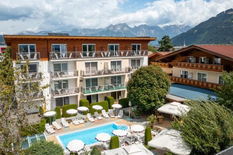 Property building, Patio, Natural landscape, Mountain view, Pool view, Swimming pool