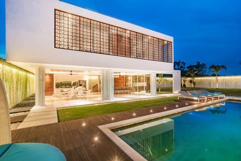 Property building, Patio, Night, Pool view, Swimming pool, sunbed