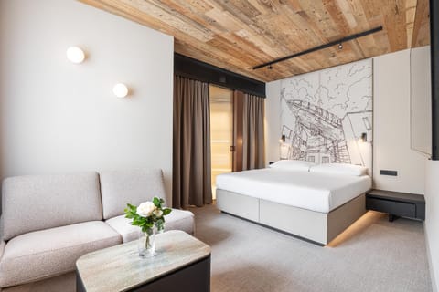Bed, Seating area, Bedroom