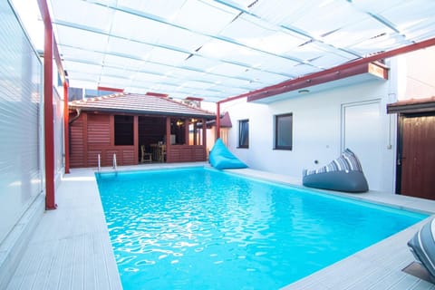 Swimming pool, sunbed