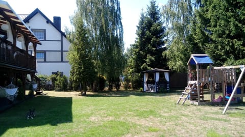 Property building, Natural landscape, Garden, Seating area, Garden view