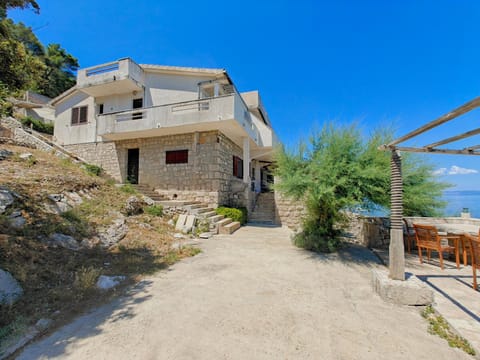 Property building, Facade/entrance, Seating area, Sea view