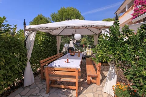 Property building, BBQ facilities, Seating area