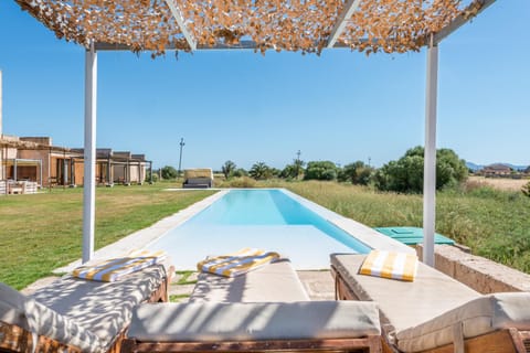 Property building, Living room, Swimming pool