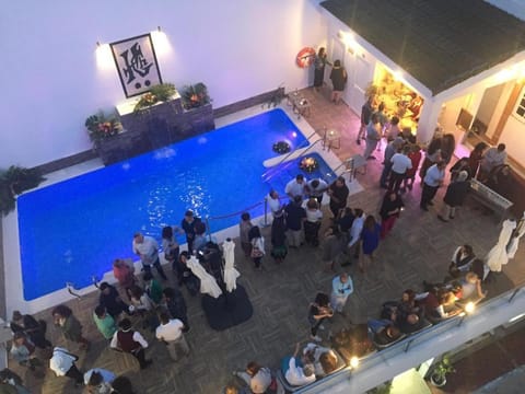Patio, Pool view, group of guests