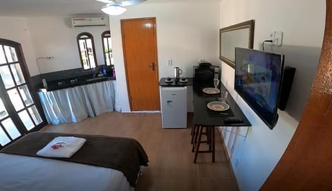 TV and multimedia, Photo of the whole room, Seating area, Communal kitchen, City view