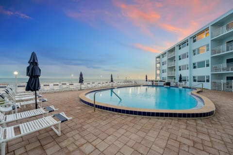Property building, Patio, View (from property/room), Balcony/Terrace, Beach, Evening entertainment, Pool view, Sea view, Swimming pool, Swimming pool, Sunrise, Sunset, sunbed