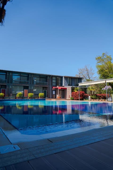Property building, Pool view, Swimming pool, sunbed