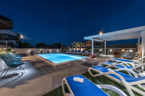 Patio, Night, Garden, Pool view, Swimming pool, sunbed