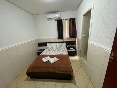 Bed, Photo of the whole room, Bedroom, towels, air conditioner