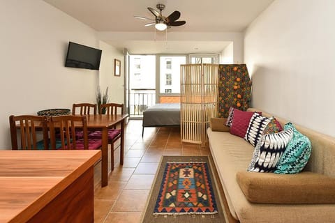 Bed, TV and multimedia, Living room, Photo of the whole room, Seating area, Dining area, Bedroom