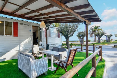 Property building, Patio, Spring, Natural landscape, Garden, View (from property/room), Balcony/Terrace, Living room, Seating area, Garden view, Sea view