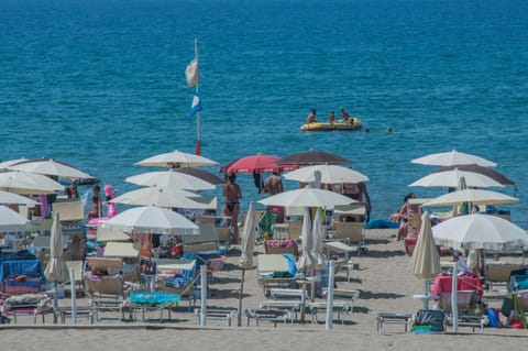Day, People, Natural landscape, Beach, Sea view, sunbed