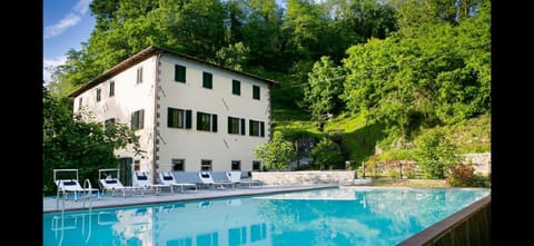 Property building, Day, Natural landscape, Garden, Pool view, Swimming pool, sunbed