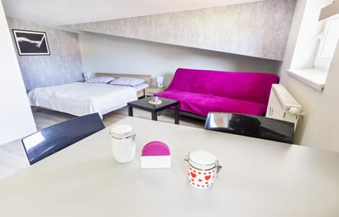 Bed, Living room, Seating area, Bedroom