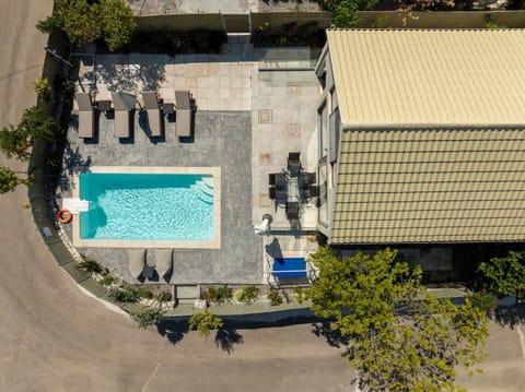 Property building, Day, Bird's eye view, Pool view, Swimming pool, Parking, sunbed