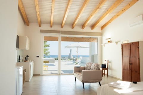 Natural landscape, TV and multimedia, Living room, Seating area, Dining area, Sea view