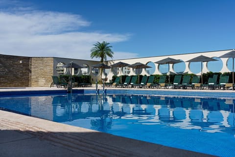 Swimming pool, sunbed