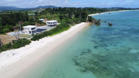 Property building, Natural landscape, Bird's eye view, Beach, Sea view