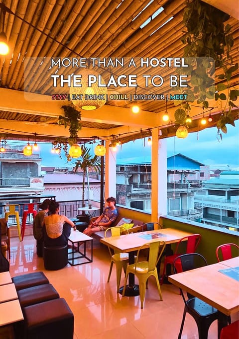 Property building, Patio, Restaurant/places to eat, Day, People, People, People, Living room, Banquet/Function facilities, Seating area, Guests, Guests, Guests, City view, City view