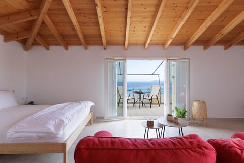 Bed, Seating area, Sea view