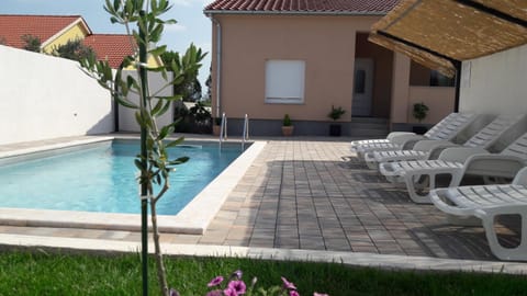 Property building, Beach, Swimming pool