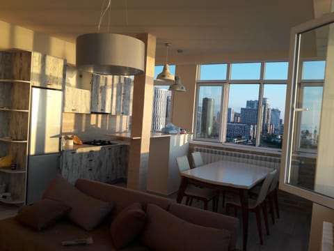 Kitchen or kitchenette, Living room, Dining area, Lake view, Sea view, Street view