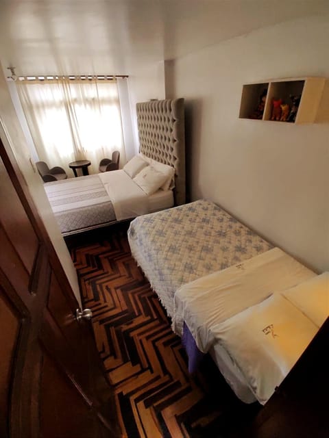 Bed, View (from property/room), Photo of the whole room, Decorative detail, Bedroom, City view, Landmark view, Street view, Area and facilities, Non alcoholic drinks, older children, Family, furniture, internet, towels