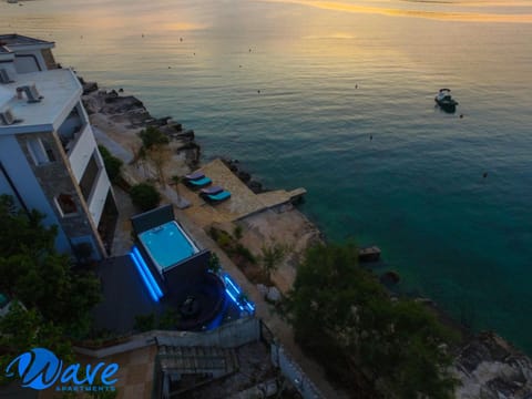 Property building, Neighbourhood, Natural landscape, Bird's eye view, BBQ facilities, Garden, Balcony/Terrace, Beach, Beach, Sea view, Swimming pool, Swimming pool