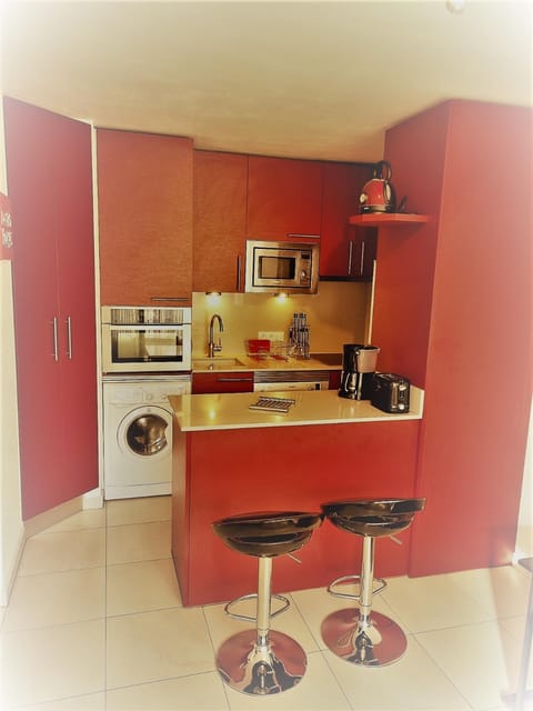 Kitchen or kitchenette, stove, kitchen