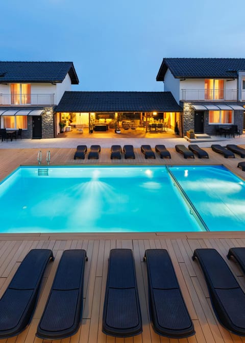 Property building, Patio, Swimming pool, sunbed