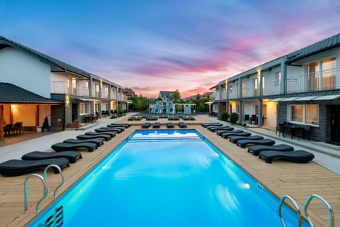 Property building, Pool view, Swimming pool, sunbed