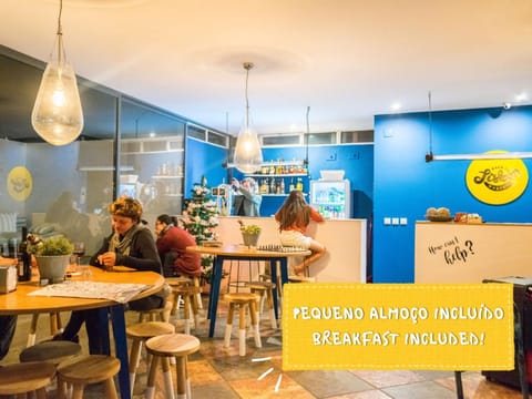 Restaurant/places to eat, People, Property logo or sign, Text overlay, group of guests
