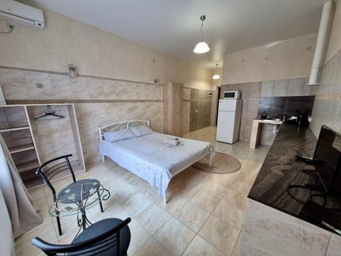 Photo of the whole room, air conditioner