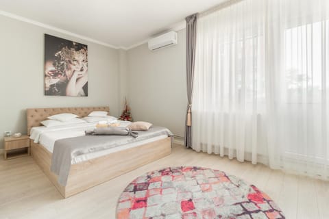 Bed, Photo of the whole room, Bedroom, towels, air conditioner