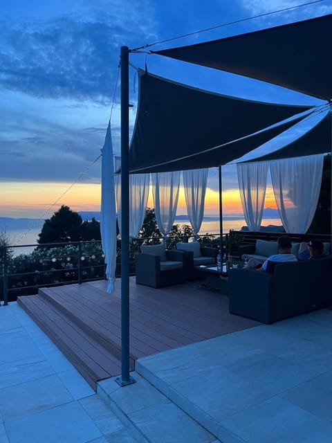 Patio, Natural landscape, Seating area, Sea view, Sunset
