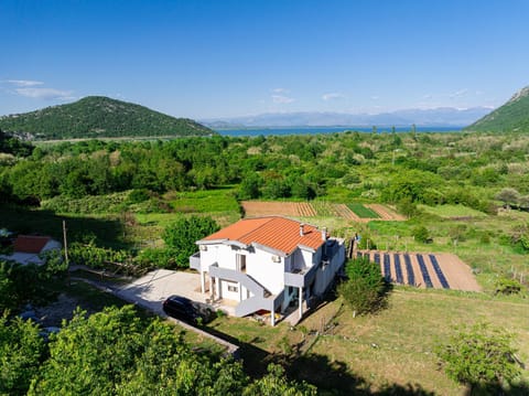 Property building, Nearby landmark, Spring, Day, Natural landscape, Bird's eye view, Mountain view