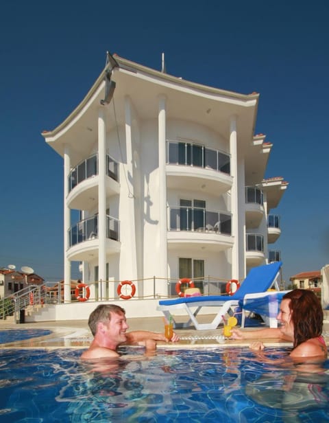 Property building, People, Pool view, Swimming pool, Swimming pool, Family