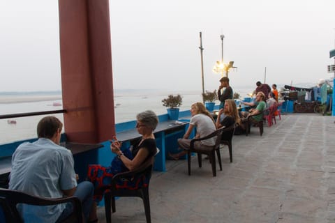Restaurant/places to eat, Day, People, Natural landscape, View (from property/room), Balcony/Terrace, Seating area